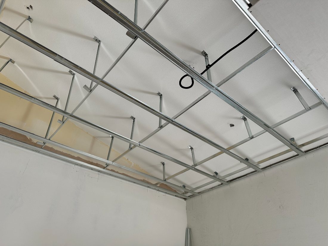 Levelled steel ceiling framework before boarding